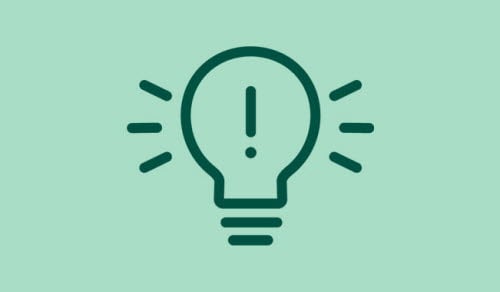 Illustration av glödlampa med ett utropstecken i. 